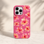 Hot pink phone case featuring a vibrant watercolor pattern of tropical pink and yellow hibiscus flowers.