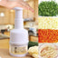 manual chopper with freshly minced carrots garlic and herbs demonstrating fine cutting results
