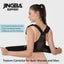 side profile of woman wearing pink back brace posture corrector for improved posture and back pain relief