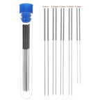 3d printer nozzle cleaning kit stainless steel needles lined up beside blue cap storage container