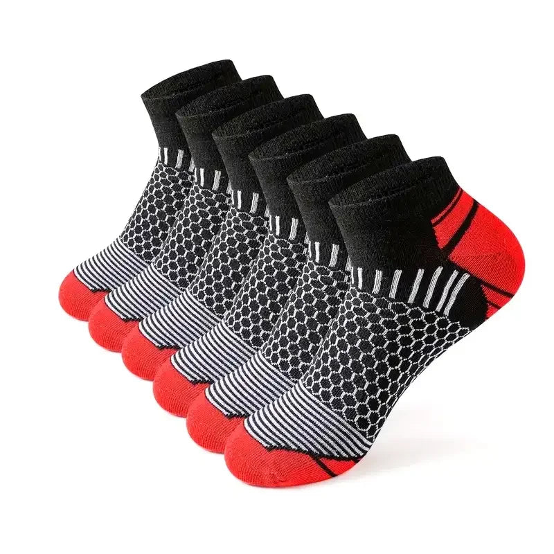 Mens short sports socks in black and red color combination with premium performance knit design