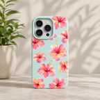 Mint green phone case featuring a pastel watercolor pattern of tropical pink and yellow hibiscus blossoms.