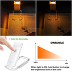 person using clip on reading light in bed for comfortable night time reading without eye strain