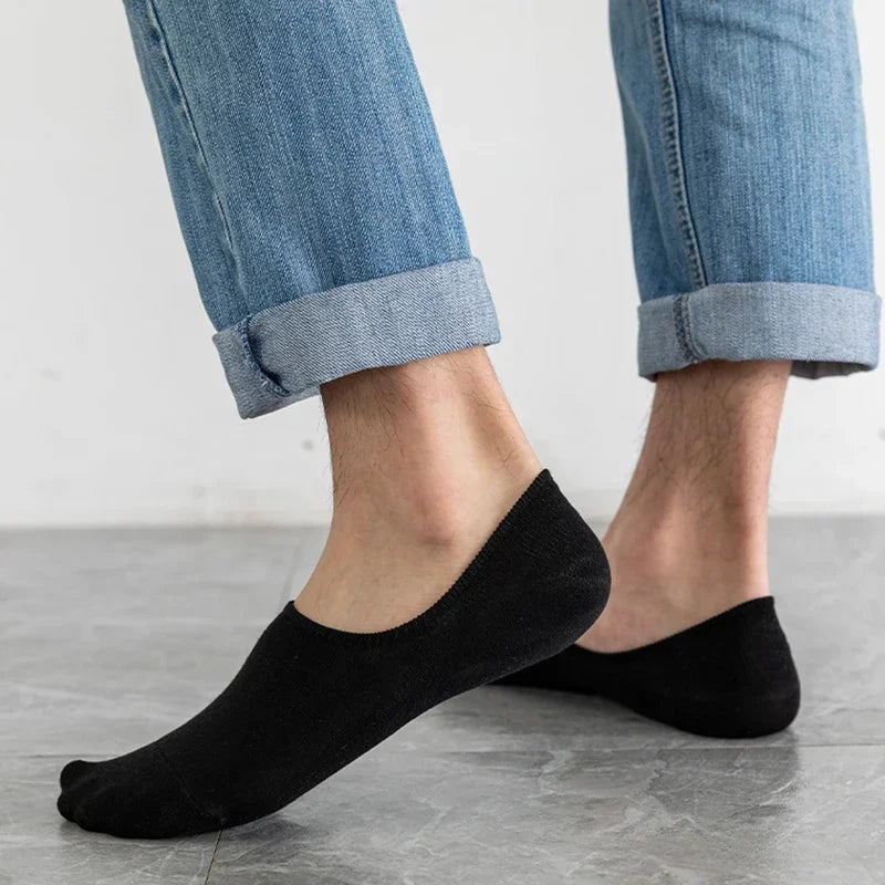 Mens low cut loafer socks on feet displaying non slip silicone heels for summer and autumn wear