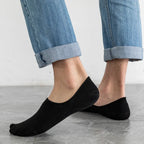 Mens low cut loafer socks on feet displaying non slip silicone heels for summer and autumn wear