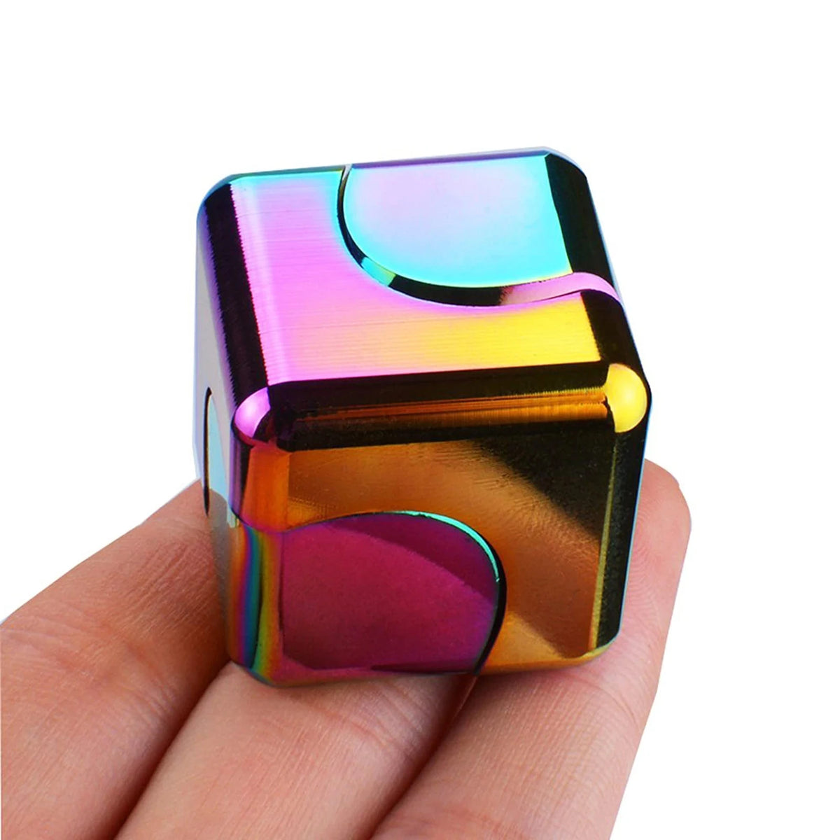 metal fidget spinner cube held in hand showing rainbow iridescent finish for tactile stress relief