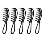 Set of five black hair combs with unique designs on a white background