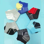 Multicolor selection of mens low tube running socks including blue black white and yellow athletic variants