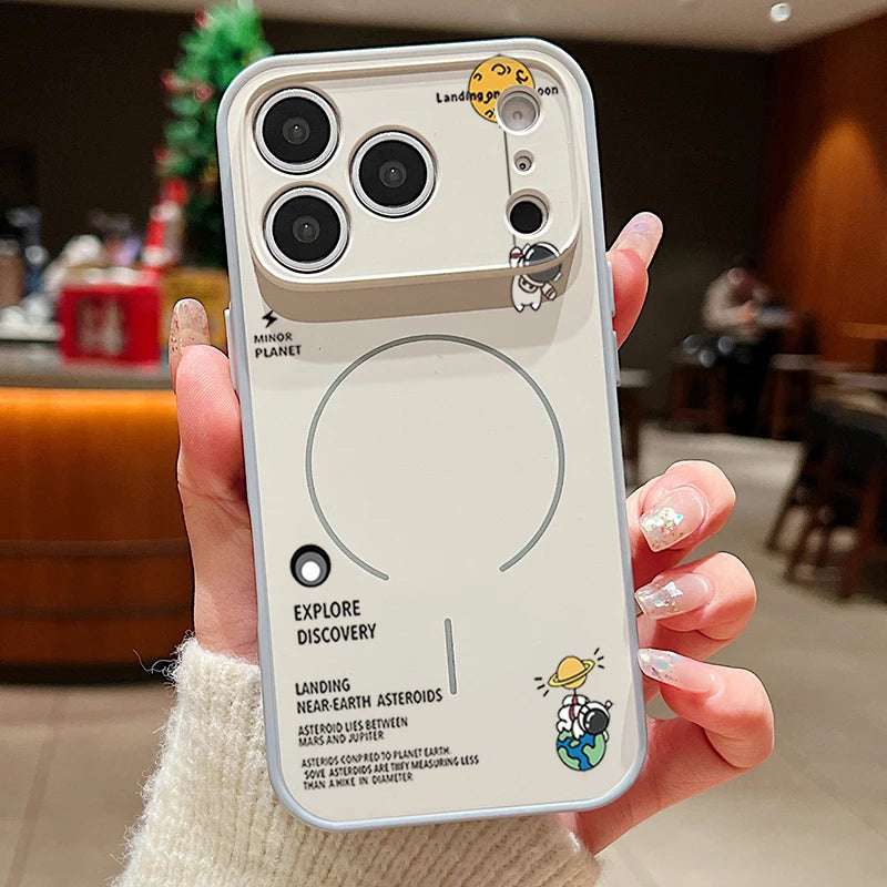 Phone case with space-themed design held by a person in an indoor setting