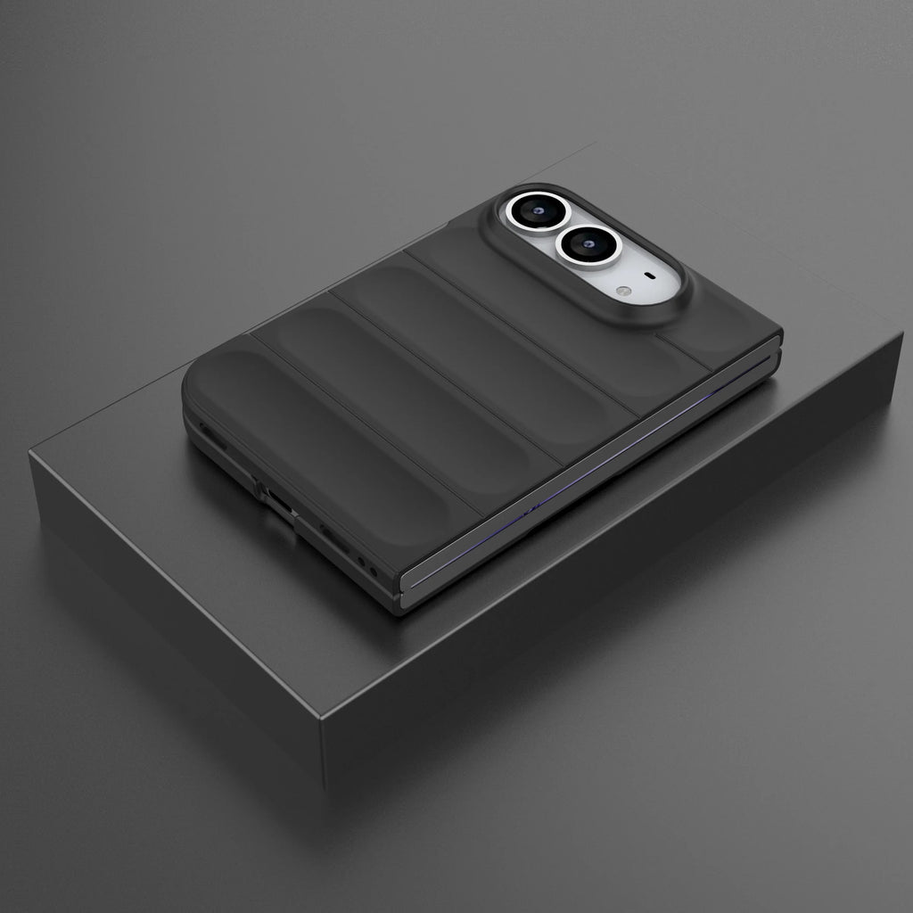 A dark gray rugged protective case for a foldable smartphone, shown closed on a matching dark gray display platform against a dark gray background.