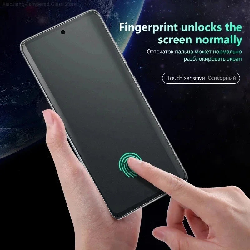Smartphone with fingerprint unlock feature being demonstrated against a space-themed background