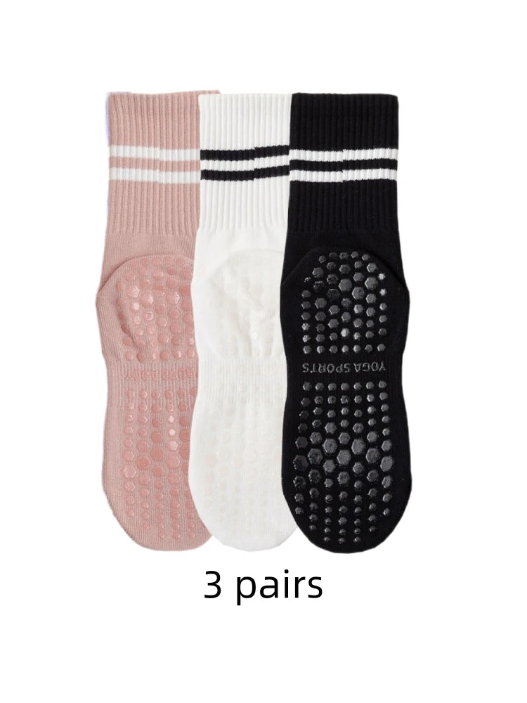 Pack of 3 pairs women athletic yoga socks containing pink white and black medium length socks