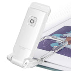 white clip on reading light showing usb rechargeable design and compact foldable book clamp