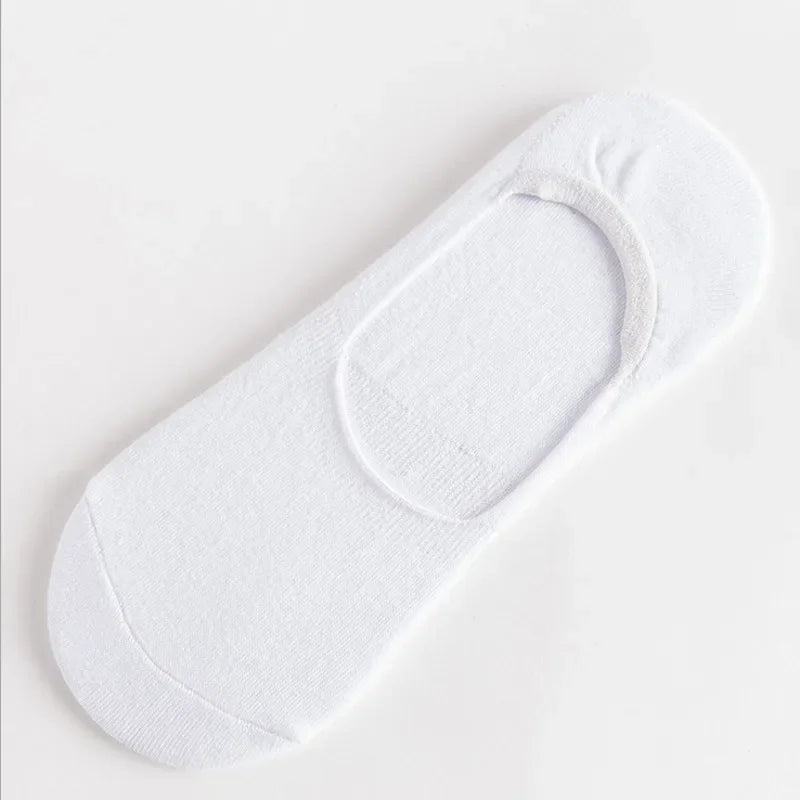 Single piece of solid white mens cotton boat sock featuring lightweight breathable summer material