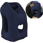 Navy blue travel neck pillow with a person using it inset on a white background