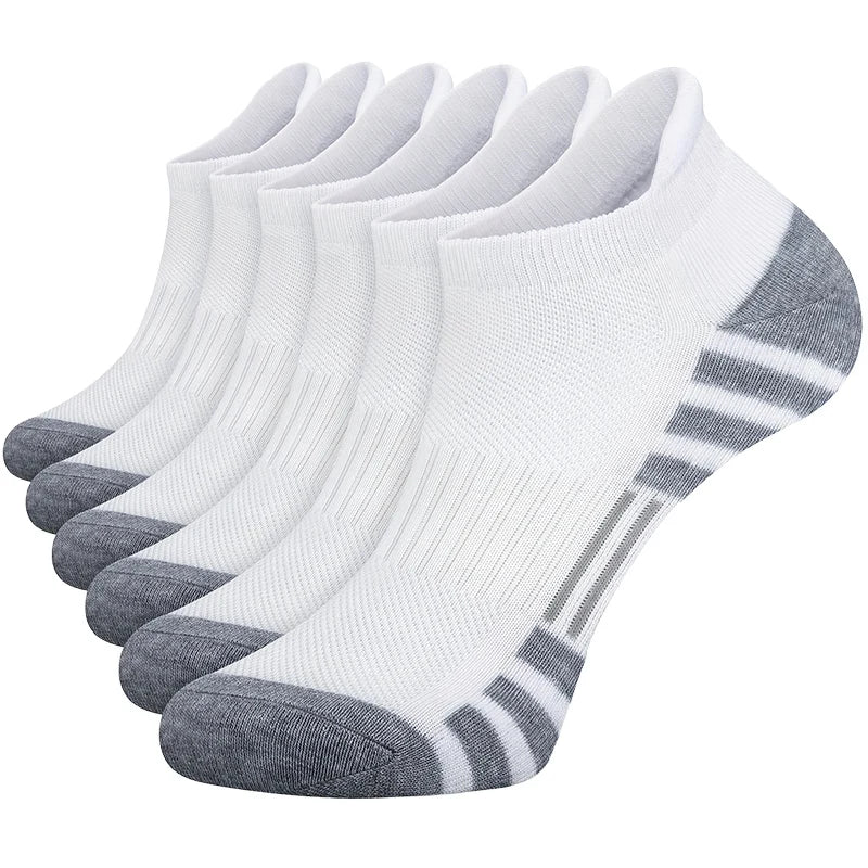 12 pairs of men's athletic low cut short tube socks in solid white color.