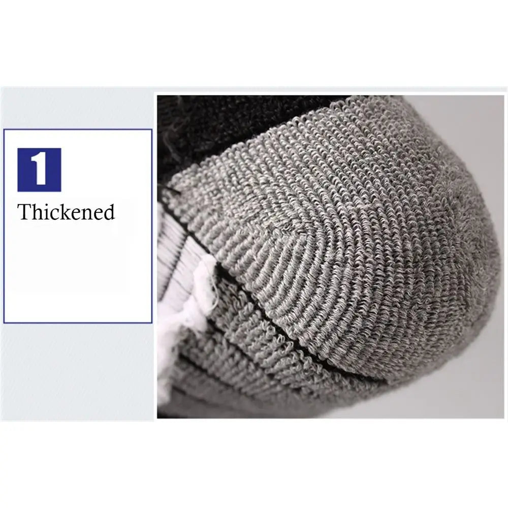 Close up view of the thickened thermal knit fabric on the heel of winter sports stockings for maximum cushioning