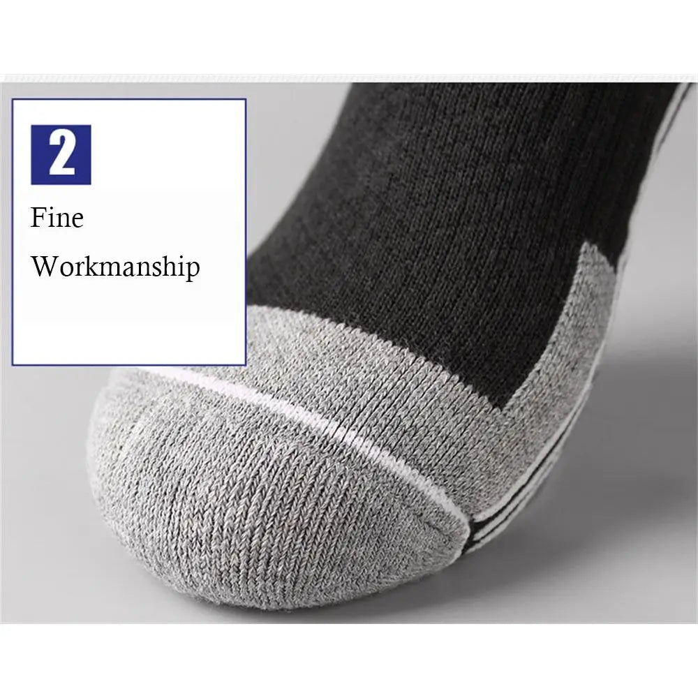 Detailed texture of the reinforced toe box on breathable compression ski socks providing warmth and comfort