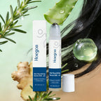 hair growth serum bottle with fresh rosemary sprigs and ginger root for nourishing scalp treatment