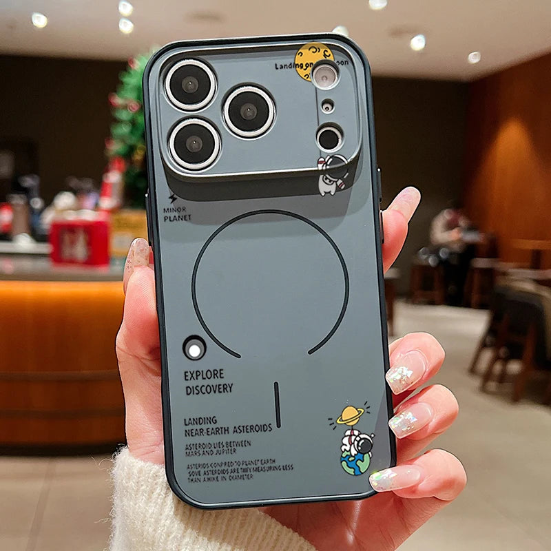 Phone case with space-themed design held by a person in an indoor setting