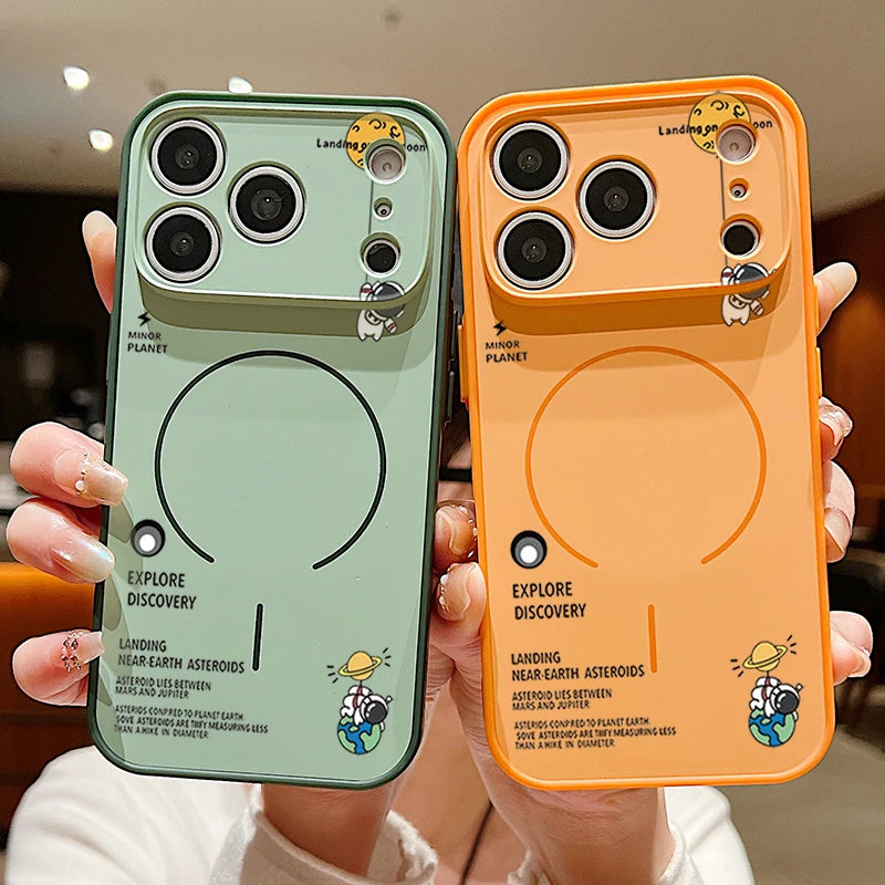 Two phone cases, one green and one orange, held by a person.