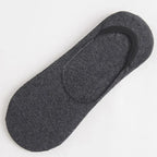 Single piece of mens dark grey non slip no show sock showing the seamless invisible athletic design