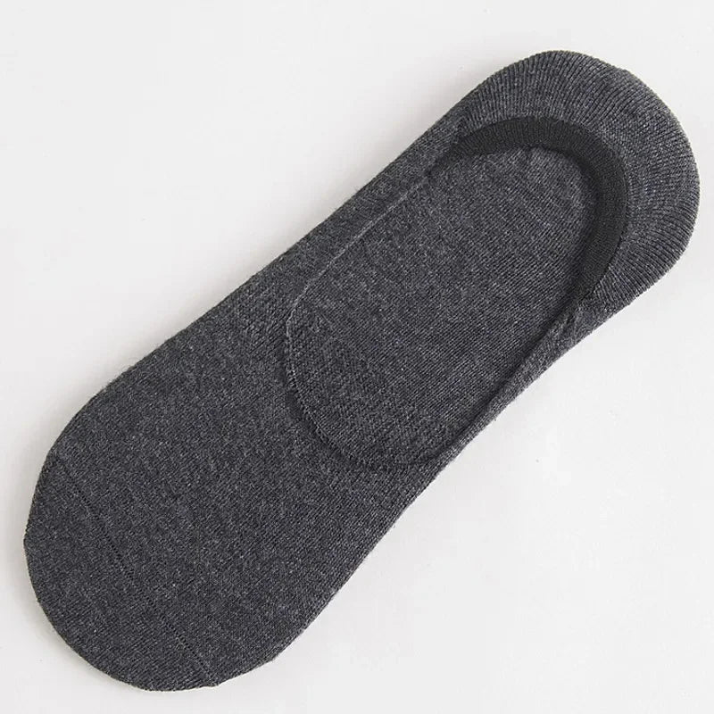 Single piece of mens dark grey non slip no show sock showing the seamless invisible athletic design