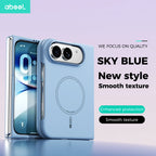 A light sky blue phone case shown on a smartphone, with the back of the case featured prominently. The case has a circular MagSafe-style ring, a camera cutout with a metallic ring accent, and a smooth textured finish.
