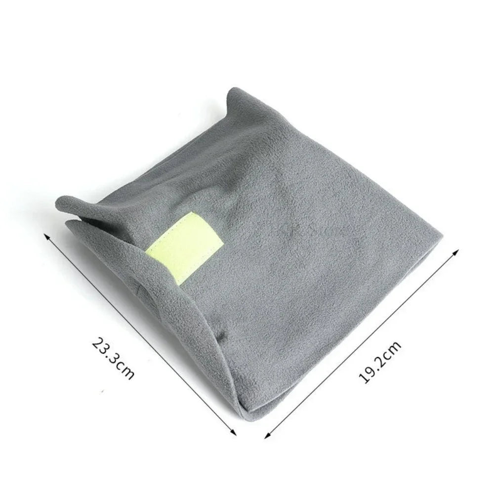 Gray pet bed with a yellow label and measurements on a white background