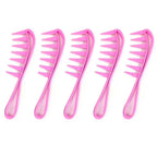 Five pink hair combs with a unique design on a white background