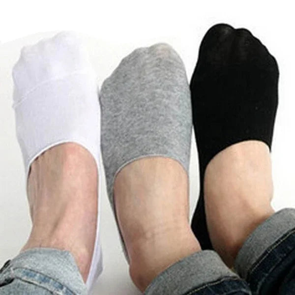 Close up of mens non slip invisible socks on feet highlighting the low profile ankle fit and stay up comfort