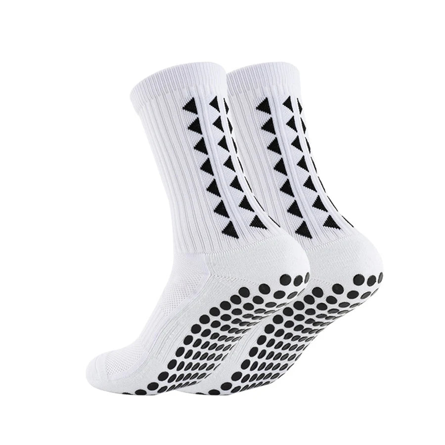 One pair of white non slip football grip socks showing the athletic design for rugby and soccer