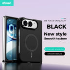 A black smartphone case shown on a phone, with the back of the case featured prominently. The case has a circular MagSafe-style ring, a camera cutout, and a smooth textured finish.