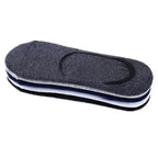 One pair of mens breathable no show sports socks rolled up neatly displaying the elastic cuff