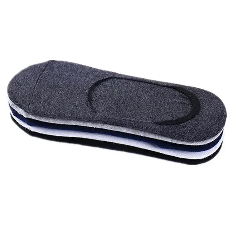 One pair of mens breathable no show sports socks rolled up neatly displaying the elastic cuff