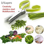 Multifunctional kitchen shears with vegetables and herbs on a white background