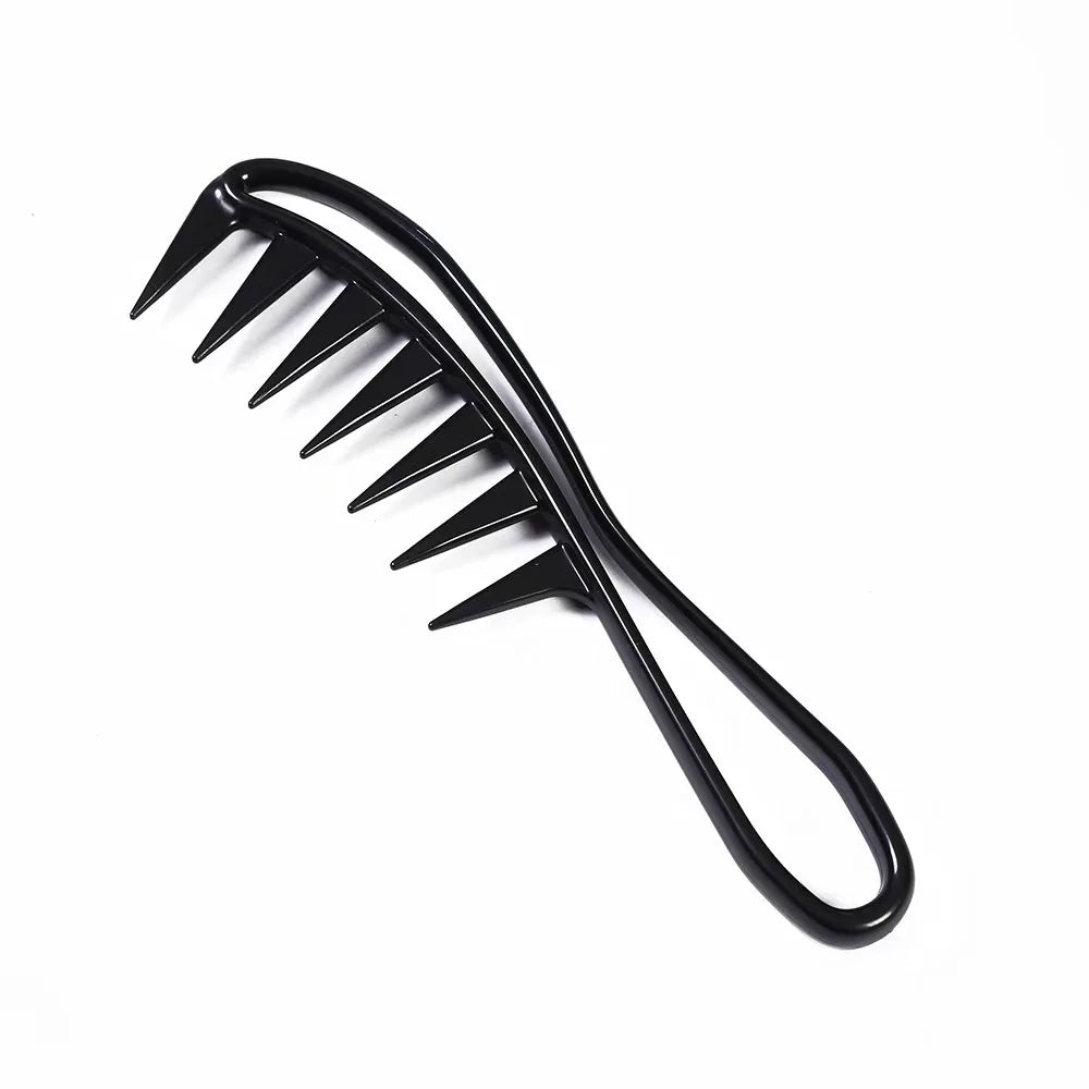 Black hair comb on a white background