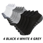 Pack of 12 pairs men's sports socks with mixed color variants including 4 black, 4 white, and 4 grey.