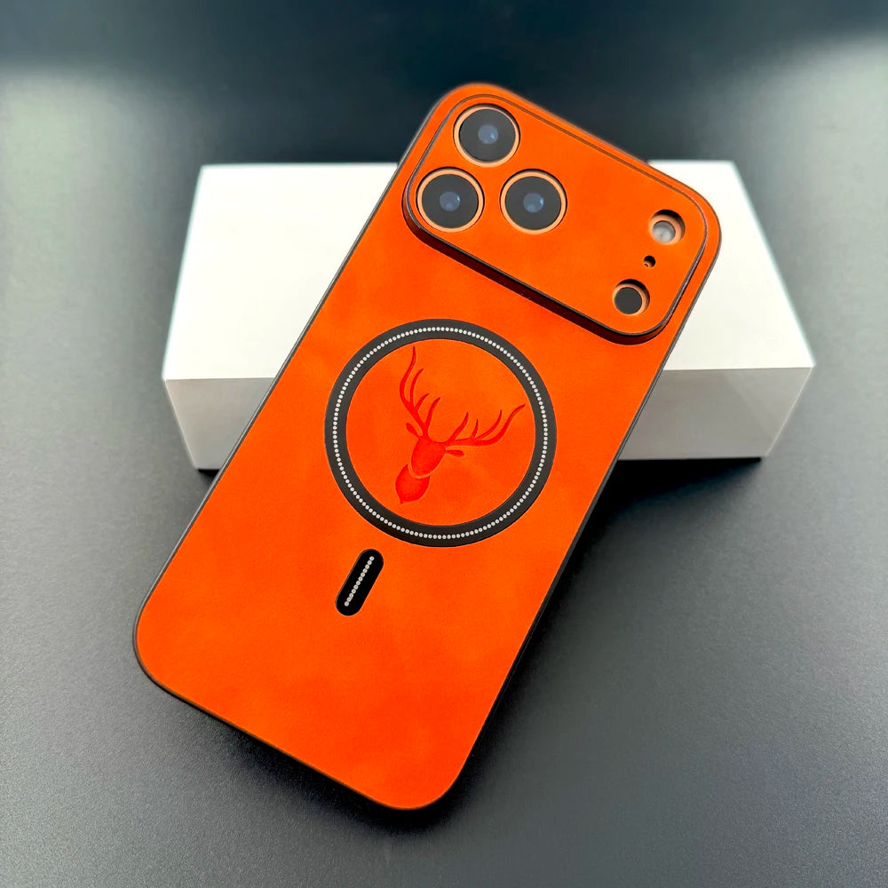 Orange phone case with deer design on a dark surface