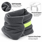 Dark gray fleece neck warmer with a bright yellow-green reflective band, shown with callout text and inset graphics explaining soft outside, structured support, and ergonomic wrap design.