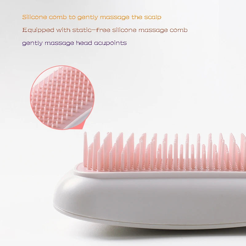 Silicone comb with massage head and static-free feature on a white background