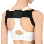adjustable back posture corrector in black worn over upper back to prevent slouching and back pain