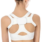 adjustable back posture corrector in white worn discreetly on upper back for shoulder posture support