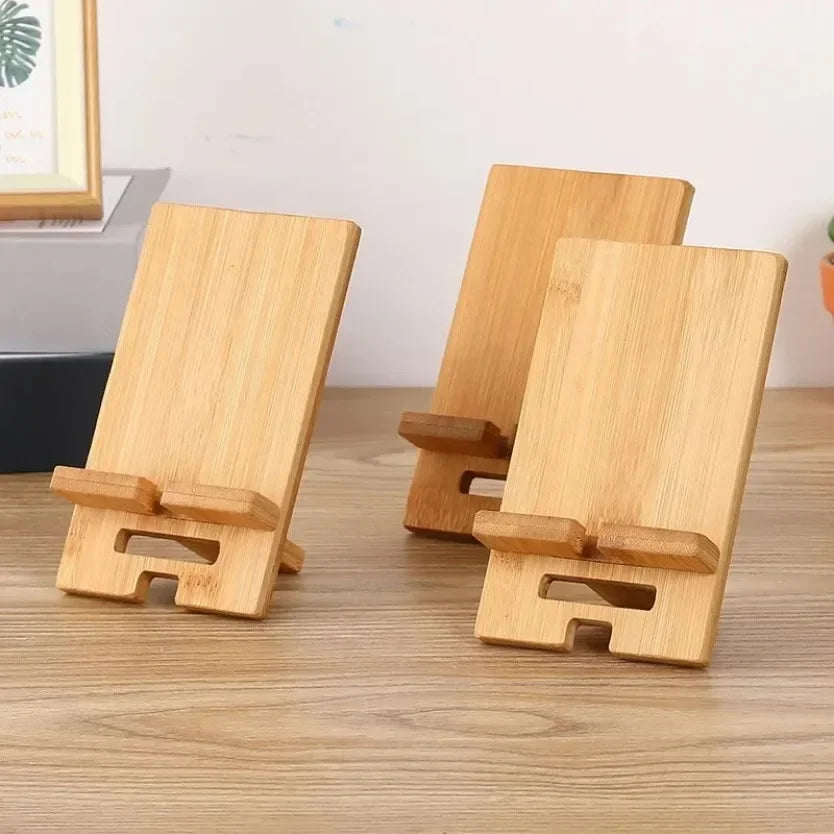 adjustable wooden phone stand showing natural wood finish and adjustable slot grooves for desk use
