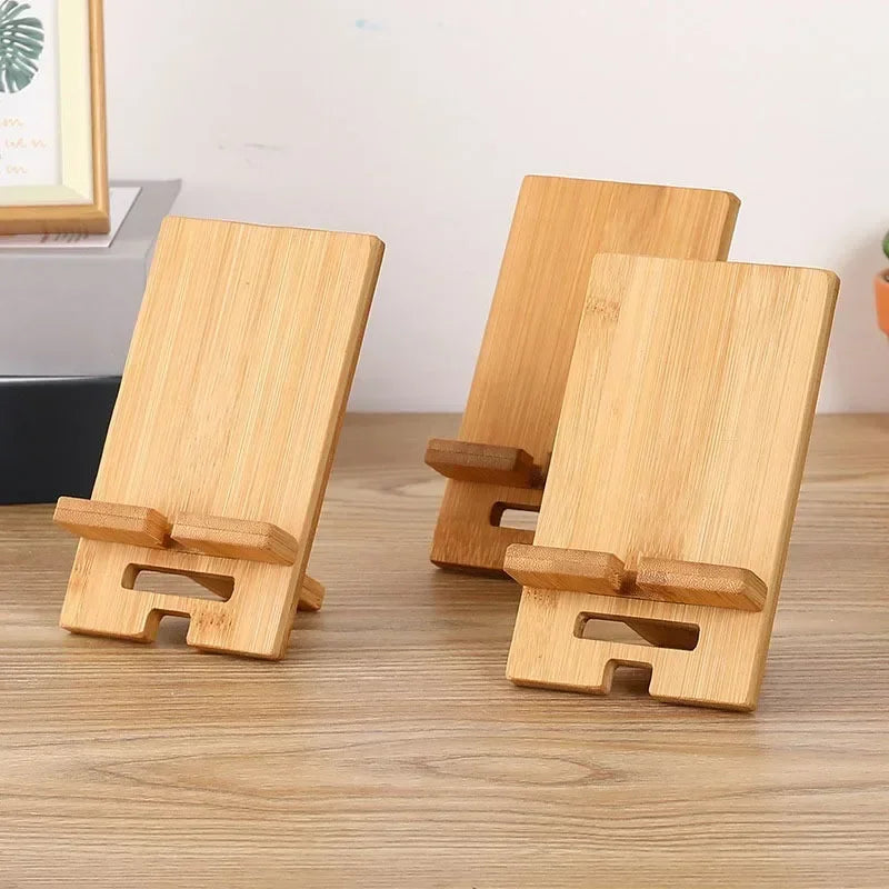 adjustable wooden phone stand pair showing natural bamboo grain and compact desktop design