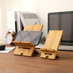 adjustable wooden phone stand placed on office desk next to keyboard for hands free mobile viewing