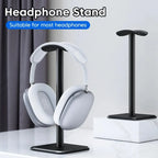 aluminium headphone stand holding white gaming headset on modern desk for neat cable organization