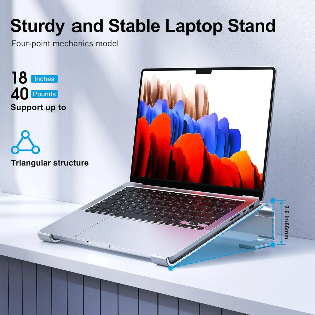 Aluminum laptop cooling stand riser on home office desk for an organized and comfortable work environment.