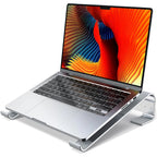 Aluminum laptop cooling stand riser with MacBook mounted to improve viewing angle and desk ergonomics.