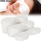 disposable eye mask paper cotton patches stack with model wearing eye mask for under eye hydration spa care